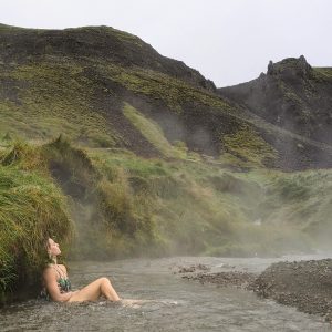 Anna in one of Iceland's famous hot springs, one of the best things to do in Iceland