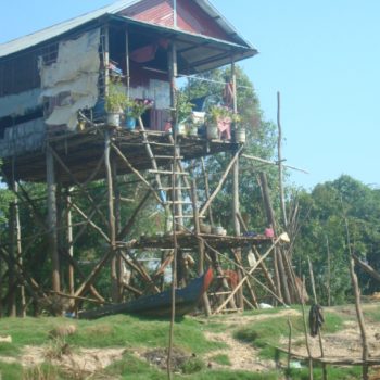 A photo of a house built on stilts to avoid the floodwaters during the rainy season