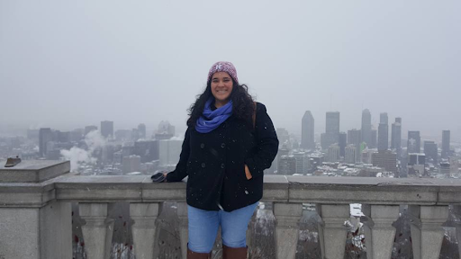 Alexandra posing in front of the city on her last day of her study exchange in Canada.
