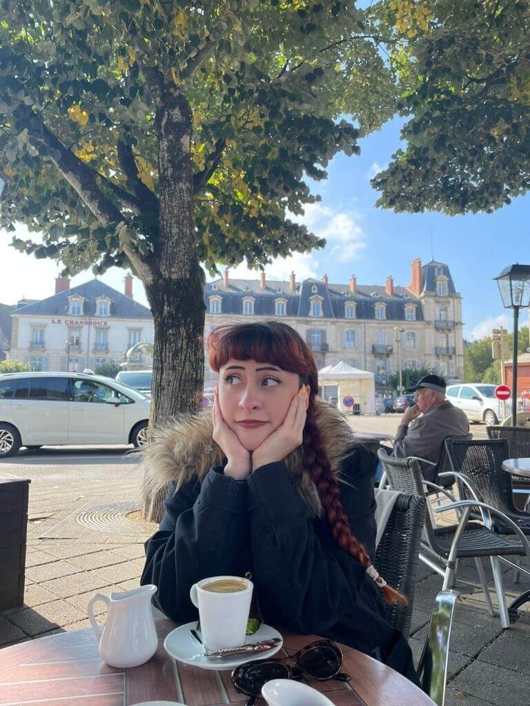 Alice in the cafe in Dijon