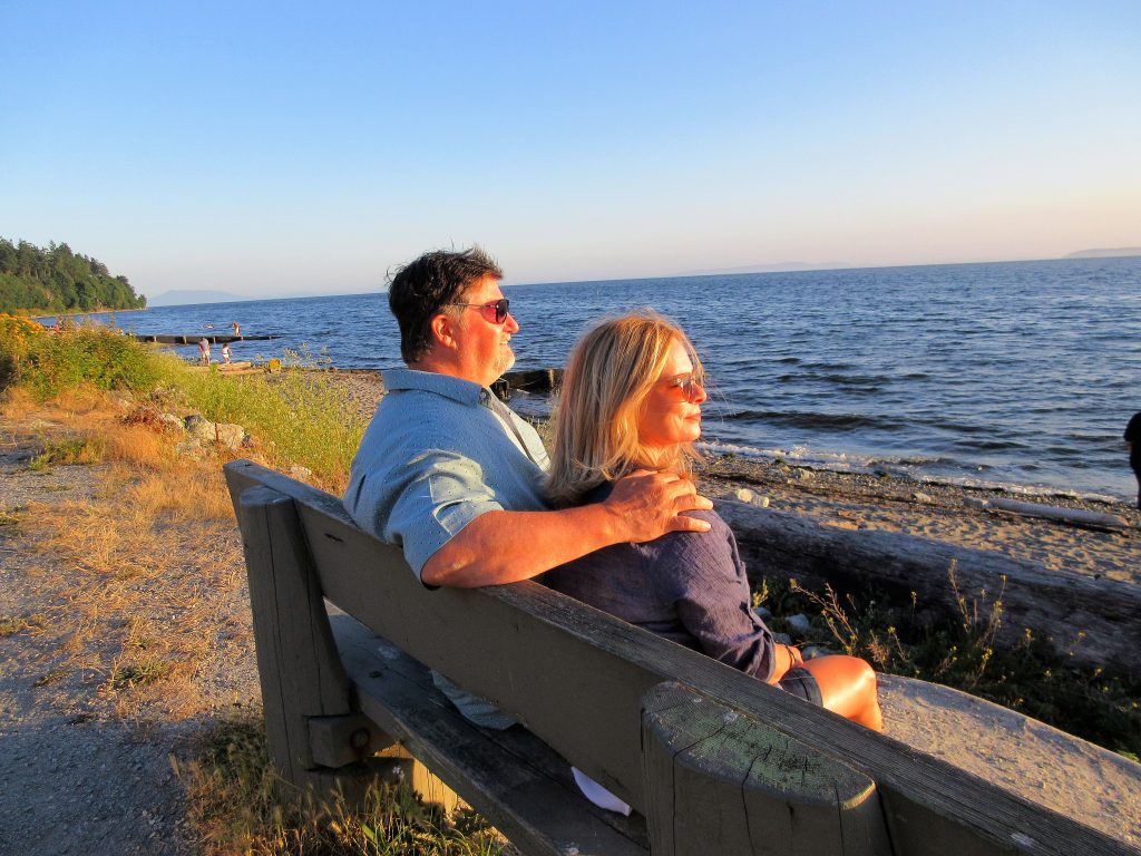 Ed and his wife looking out over the water in Crescent Beach near Vancouver.