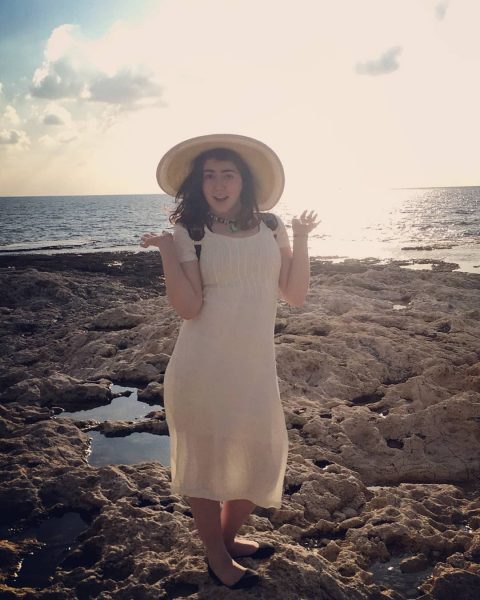 Alana posing on the Hof HaCarmel Beach in Israel while on her Hillel trip.