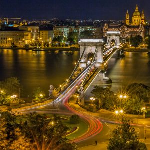 Night traffic across a bridge in Hungary.