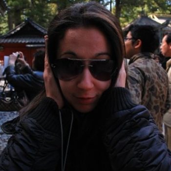 Maria, an English teacher in Japan, replicating the hear no evil sign