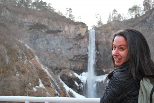 Maria, an English teacher in Japan, looking at a waterfall in the snow in Japan