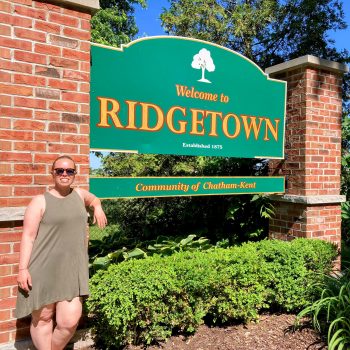 Kristen with Ridgetown sign
