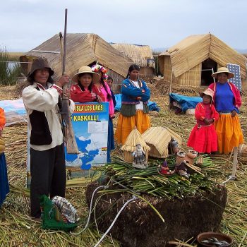 Some Uros Villagers on Lake Titicaca, one of the best things to do in Peru.